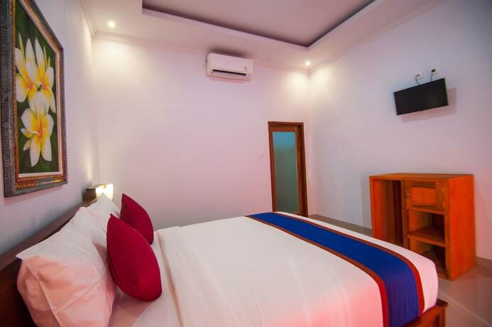 Imagen de la habitación del Hotel The Dagan Bungalow. Foto 28