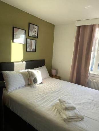 Imagen de la habitación del Hotel The Davron. Foto 4