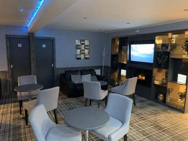 Imagen del bar/restaurante del Hotel The Davron. Foto 2