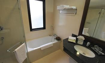 Imagen de la habitación del Hotel The Dawin. Foto 9