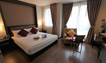 Imagen de la habitación del Hotel The Dawin. Foto 10