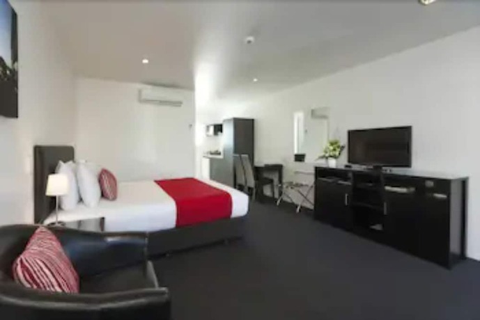 Imagen de la habitación del Hotel The Dawson Motel. Foto 17