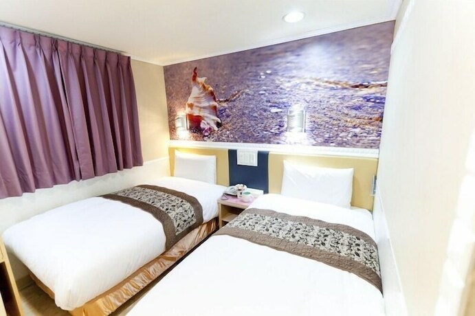 Imagen de la habitación del Hotel The Dealer Hotel. Foto 18