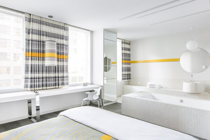 Imagen de la habitación del Hotel The Delphi. Foto 7