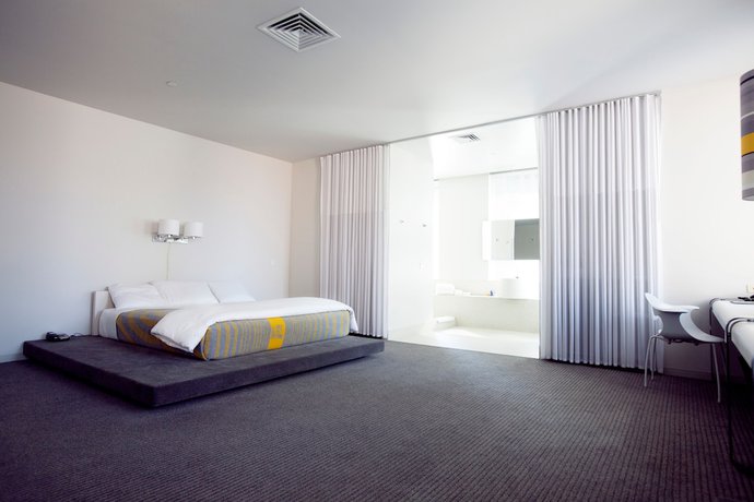 Imagen de la habitación del Hotel The Delphi. Foto 8