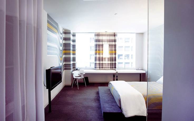 Imagen de la habitación del Hotel The Delphi. Foto 9