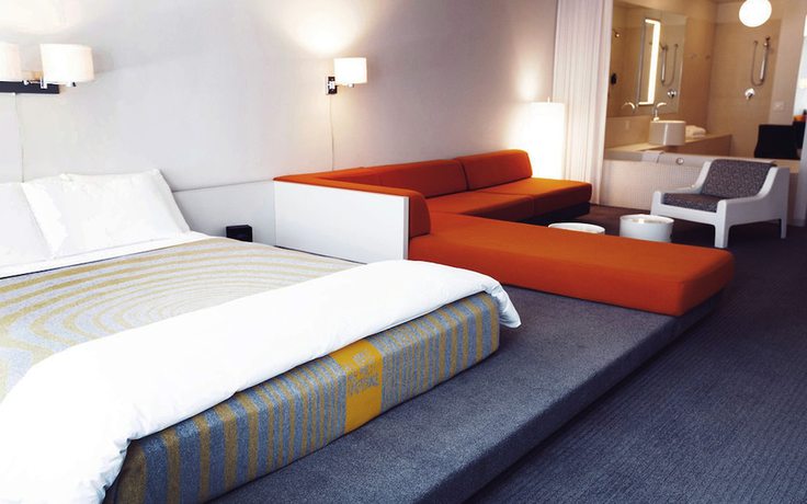 Imagen de la habitación del Hotel The Delphi. Foto 11