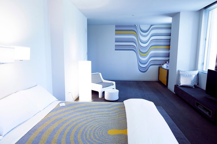 Imagen de la habitación del Hotel The Delphi. Foto 15