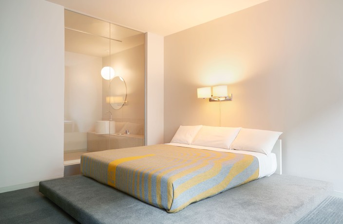 Imagen de la habitación del Hotel The Delphi. Foto 17