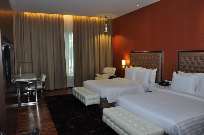 Imagen de la habitación del Hotel The Deltin. Foto 5
