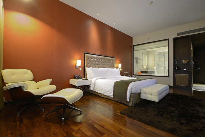 Imagen de la habitación del Hotel The Deltin. Foto 8