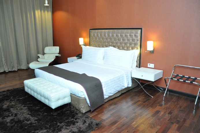Imagen de la habitación del Hotel The Deltin. Foto 10