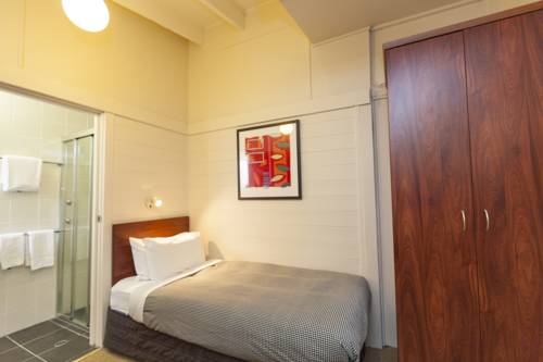 Imagen de la habitación del Hotel The Denman. Foto 2