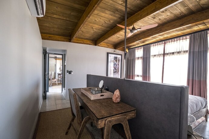 Imagen de la habitación del Hotel The Desert Grace. Foto 20