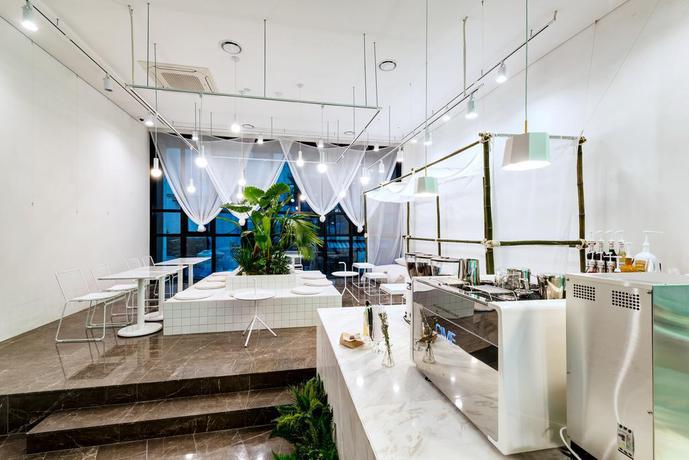 Imagen del bar/restaurante del Hotel The Designers Ddp. Foto 1