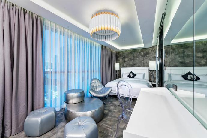 Imagen de la habitación del Hotel The Designers Ddp. Foto 2