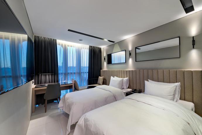 Imagen de la habitación del Hotel The Designers Ddp. Foto 10