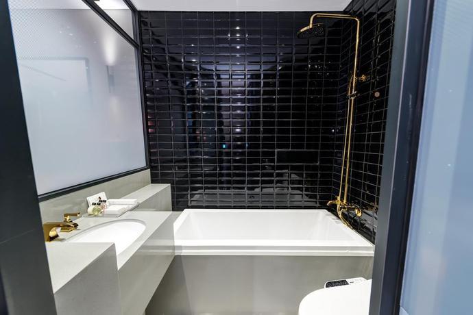 Imagen de la habitación del Hotel The Designers Ddp. Foto 12