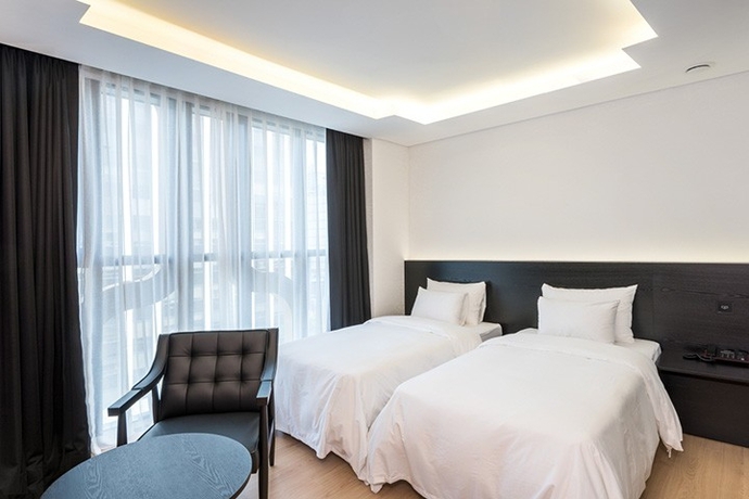 Imagen de la habitación del Hotel The Designers Dongdaemun. Foto 9