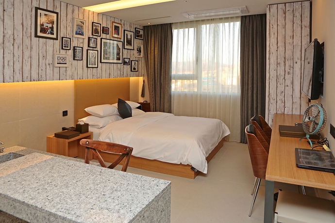 Imagen de la habitación del Hotel The Designers Hongdae. Foto 2