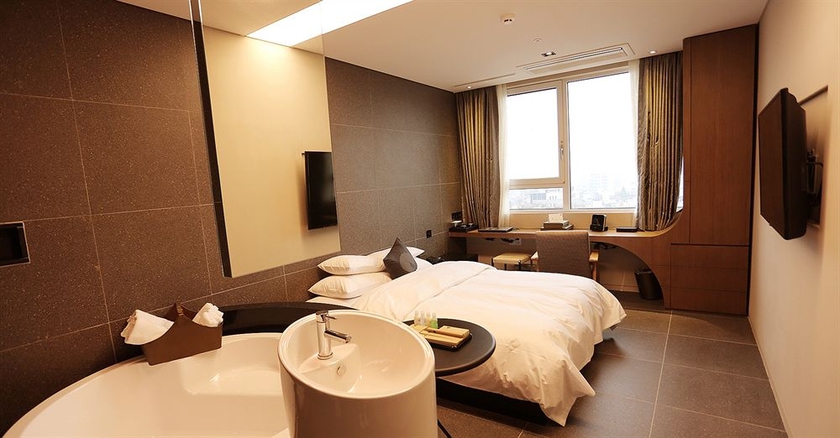 Imagen de la habitación del Hotel The Designers Hongdae. Foto 5