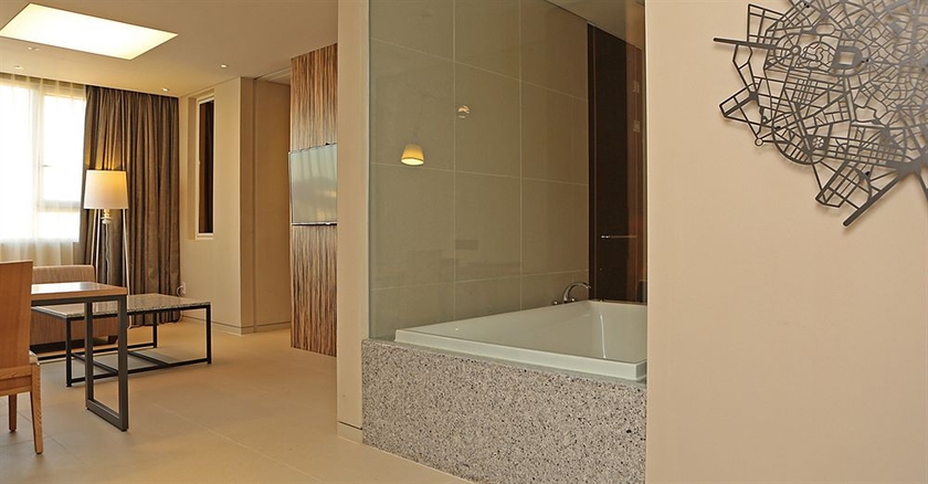 Imagen de la habitación del Hotel The Designers Hongdae. Foto 10
