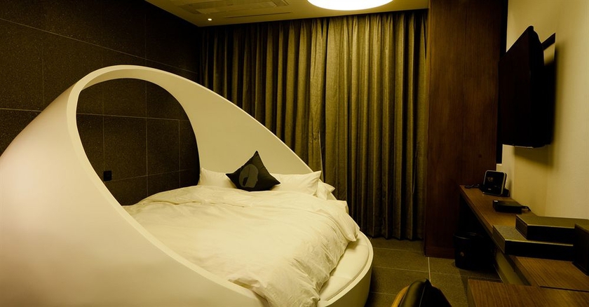Imagen de la habitación del Hotel The Designers Hongdae. Foto 11