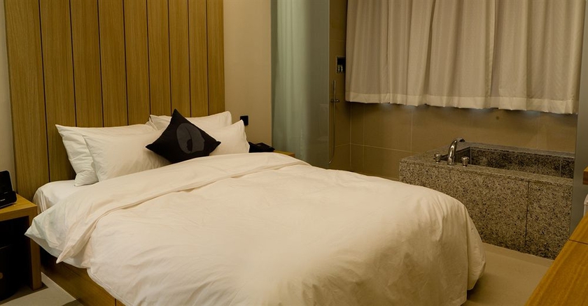 Imagen de la habitación del Hotel The Designers Hongdae. Foto 13