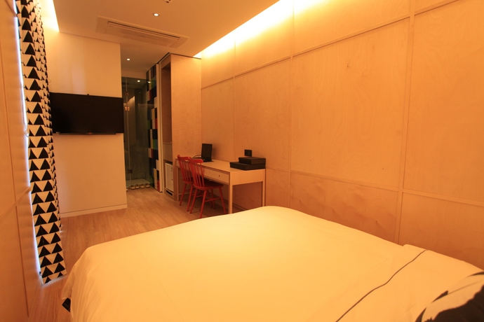 Imagen de la habitación del Hotel The Designers Jongno. Foto 4