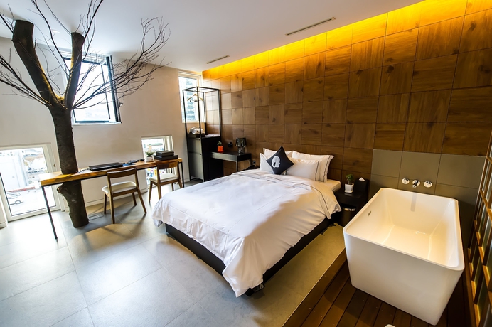 Imagen de la habitación del Hotel The Designers Jongno. Foto 8