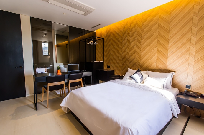 Imagen de la habitación del Hotel The Designers Jongno. Foto 11