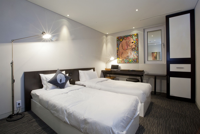Imagen de la habitación del Hotel The Designers Samseong. Foto 10