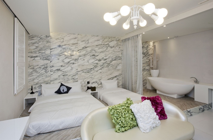 Imagen de la habitación del Hotel The Designers Samseong. Foto 16
