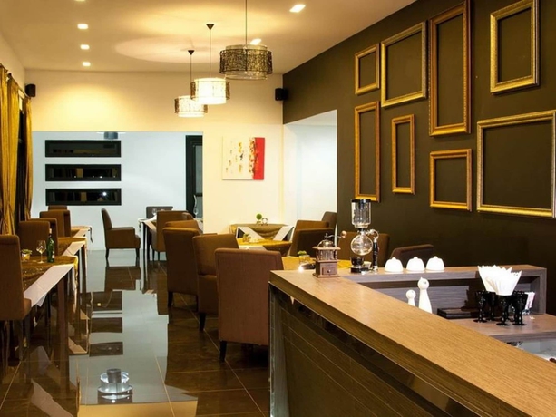 Imagen del bar/restaurante del Hotel The Desiign. Foto 5