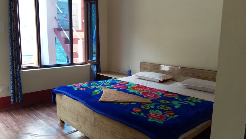 Imagen de la habitación del Hotel The Devdwar Yoga Resort. Foto 2