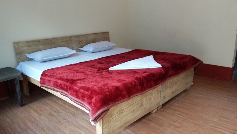 Imagen de la habitación del Hotel The Devdwar Yoga Resort. Foto 3