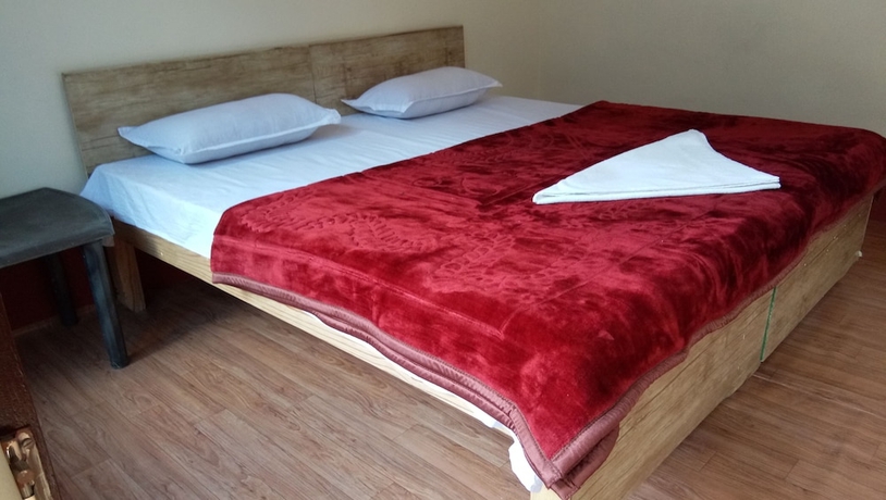 Imagen de la habitación del Hotel The Devdwar Yoga Resort. Foto 4