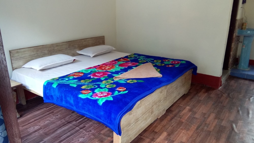 Imagen de la habitación del Hotel The Devdwar Yoga Resort. Foto 5