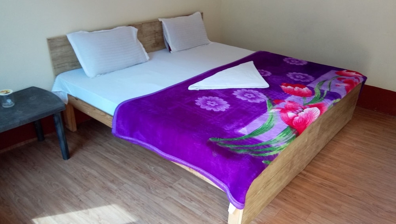 Imagen de la habitación del Hotel The Devdwar Yoga Resort. Foto 6