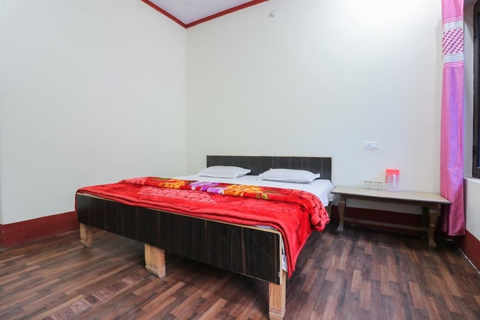 Imagen de la habitación del Hotel The Devdwar Yoga Resort. Foto 7