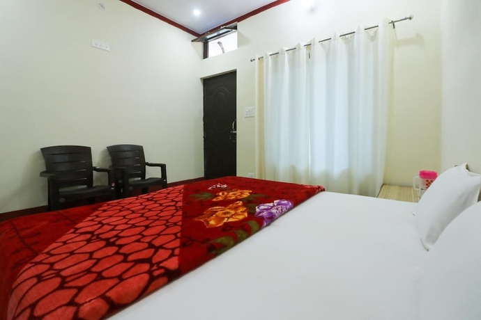 Imagen de la habitación del Hotel The Devdwar Yoga Resort. Foto 9
