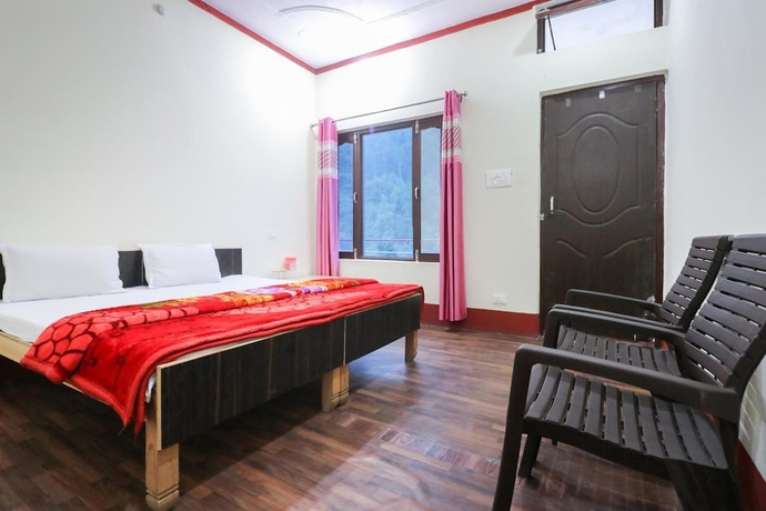 Imagen de la habitación del Hotel The Devdwar Yoga Resort. Foto 11