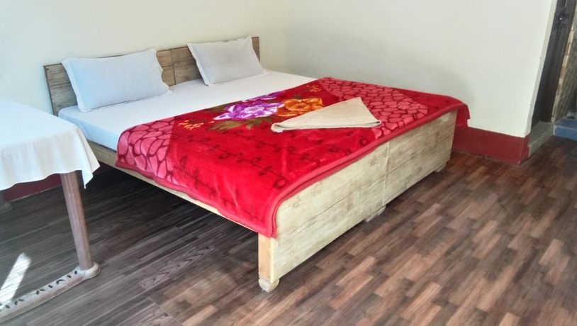Imagen de la habitación del Hotel The Devdwar Yoga Resort. Foto 12