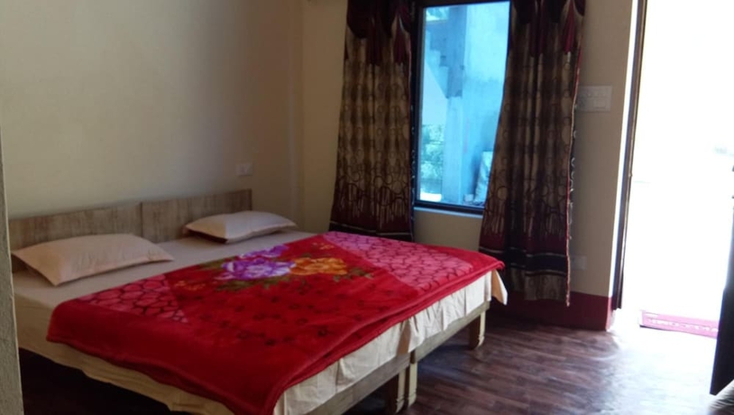Imagen de la habitación del Hotel The Devdwar Yoga Resort. Foto 13