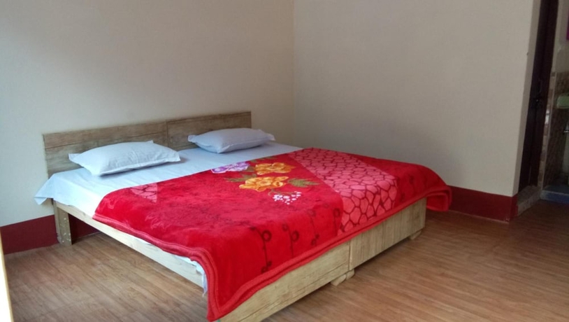 Imagen de la habitación del Hotel The Devdwar Yoga Resort. Foto 15