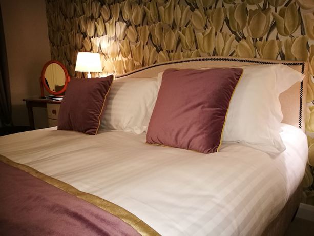 Imagen de la habitación del Hotel The Devon Court. Foto 3