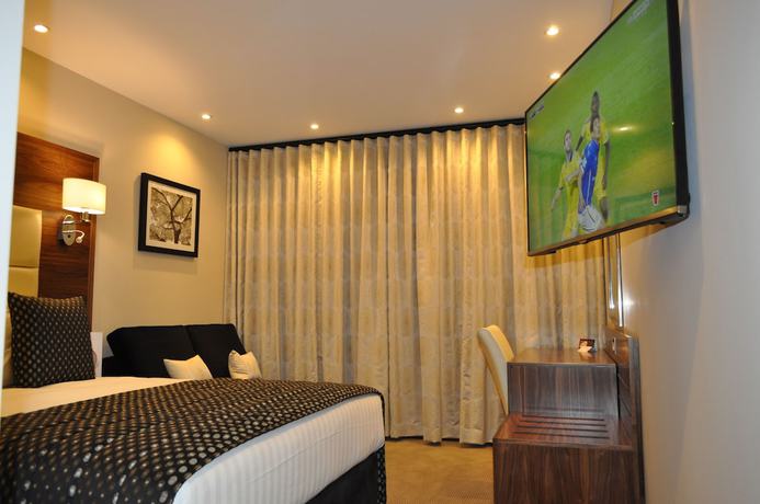 Imagen de la habitación del Hotel The Devon. Foto 14