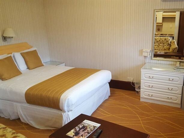 Imagen de la habitación del Hotel The Devoncourt Resort. Foto 11