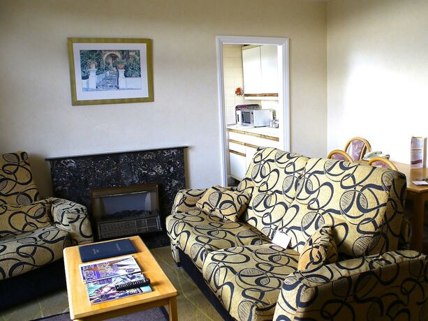 Imagen de la habitación del Hotel The Devoncourt Resort. Foto 12