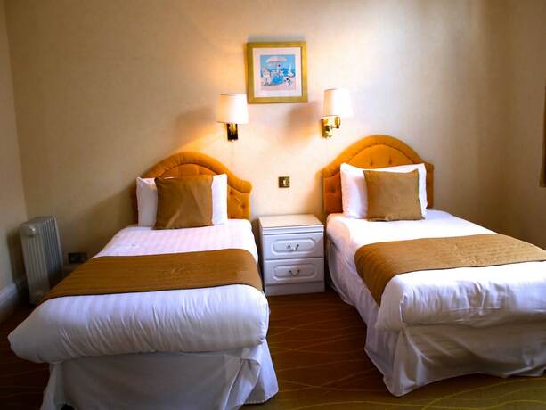 Imagen de la habitación del Hotel The Devoncourt Resort. Foto 13